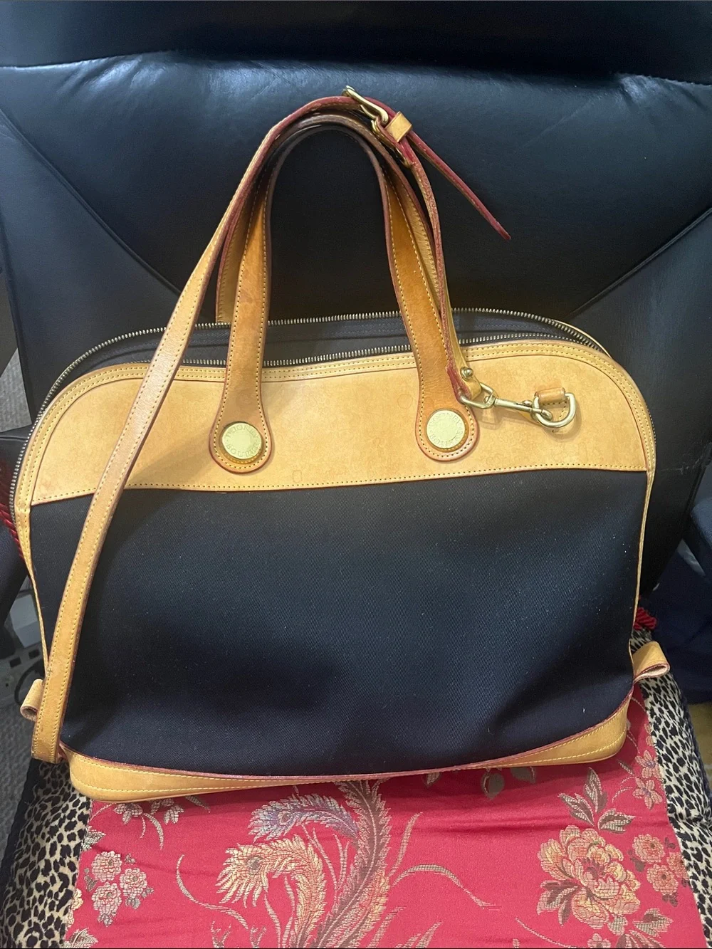 Dooney & Bourke Black and Tan Satchel with Gold Hardware